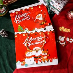 Punga cadou rosie Merry Christmas asortata cu calendarul advent bijuterii Miraza